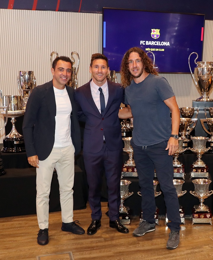 Messi, Xavi, Puyol