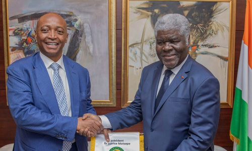 Le Président de la CAF reçu en audience par le Premier Ministre de la République de Côte d’Ivoire
